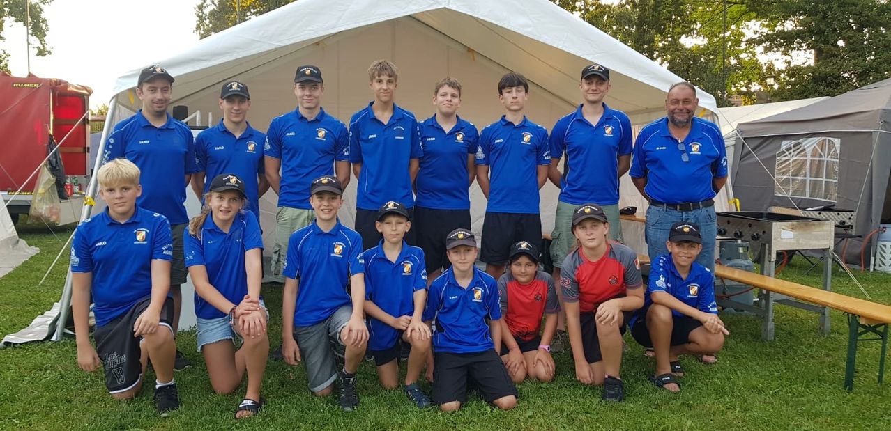 Bild enthält, People, Person, Shelter, Baseball Cap, Adult, Male, Man, Boy, Child, Team