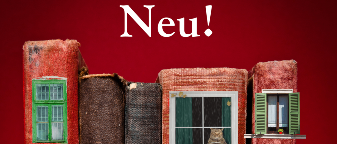 Ein Stapel Bücher, der wie ein Haus aussieht, wobei jedes Buch eine andere Fensteransicht zeigt und eine Katze aus einem der Fenster schaut.