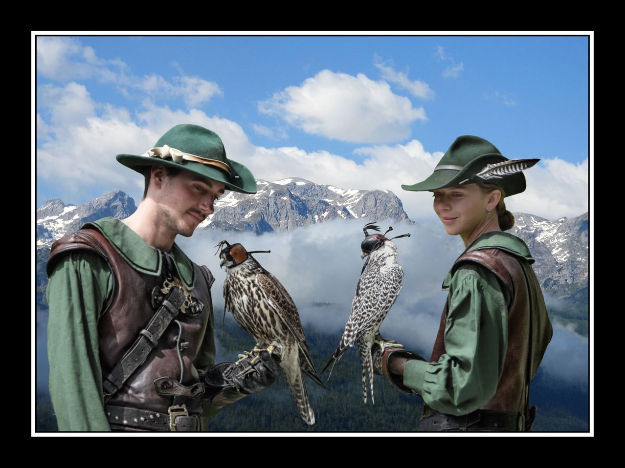 Two individuals dressed in medieval attire are standing with birds of prey on their arms. The man holds a falcon, while the woman has a peregrine falcon. They are standing against a backdrop of mountains and a cloudy sky.