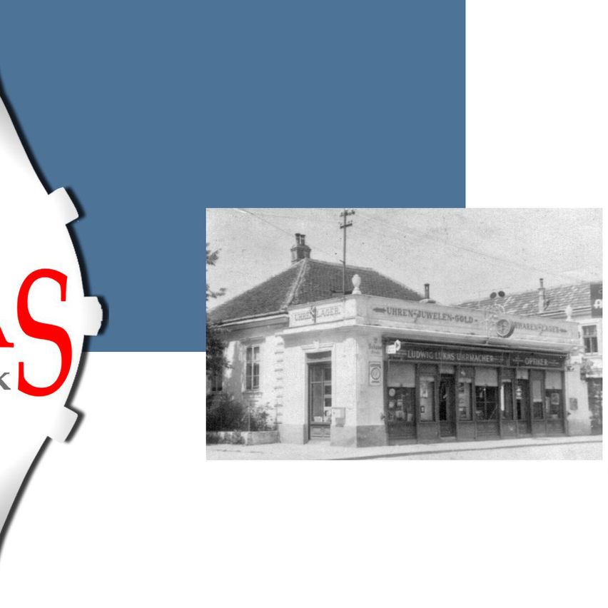 Ein historisches Gebäude mit einem Schild, auf dem 'Ludwig & Söhne Uhrmacher' steht, und einem Logo für 'Fan Kuck' und eine goldene Medaille mit der Nummer '56'.