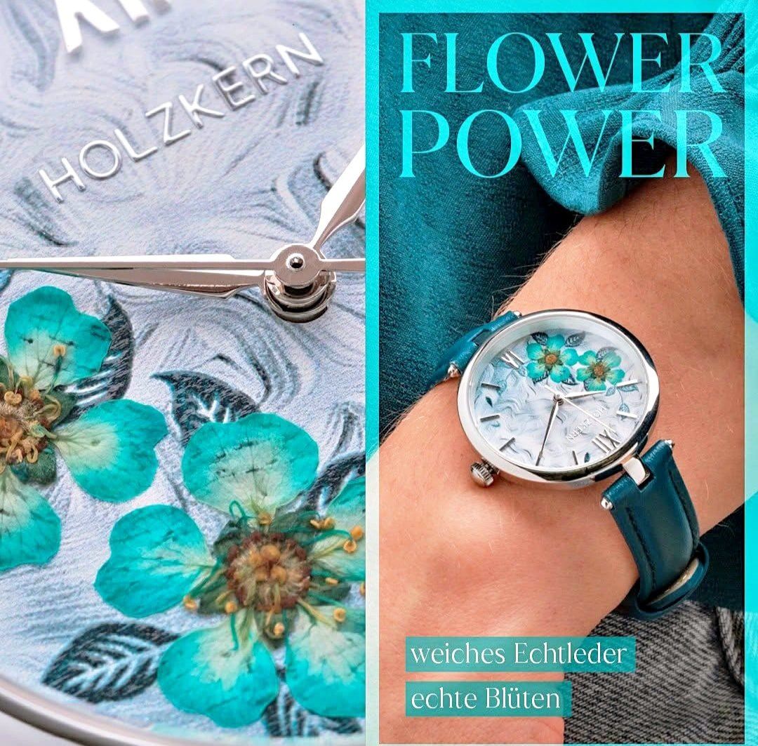 Werbung für Holzkern Uhren, die ein Handgelenk mit einem Blumen-Uhrgesicht zeigt und eine Nahaufnahme eines Uhrgesichts mit blauen Blumen.