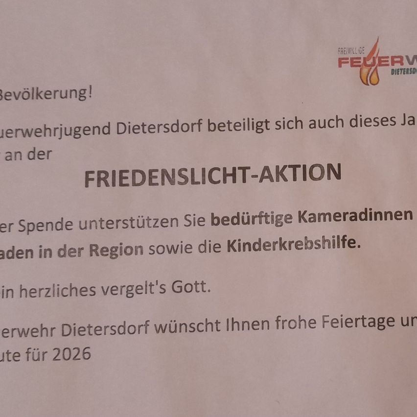 Dokument mit 'FRIEDENSLICHT-AKTION' und 'Freiwillige Feuerwehr' oben. Es handelt von Spenden zur Unterstützung bedürftiger Gemeindemitglieder und Kinderkrebshilfe. Es endet mit einem herzlichen Wunsch für ein glückliches 2026.