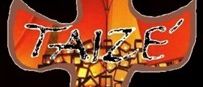 Ein kreuzförmiges Bild mit 'Taizé' in fetten Buchstaben. Eine Lichtquelle wirft ein warmes Licht und beleuchtet das komplizierte Design.