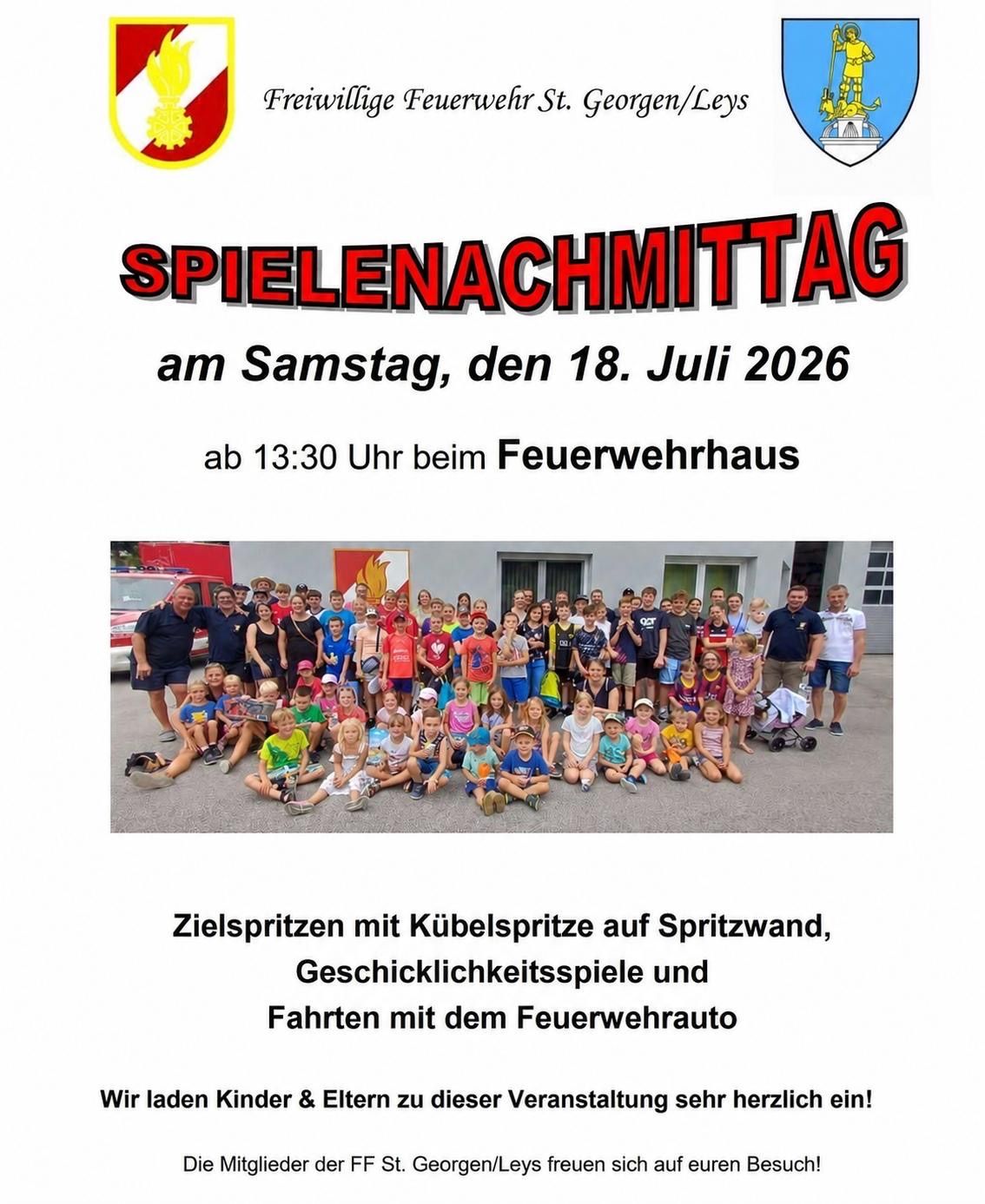 Spielenachmittag der Feuerwehr St. Georgen/Leys mit Kindern und Erwachsenen vor dem Feuerwehrhaus