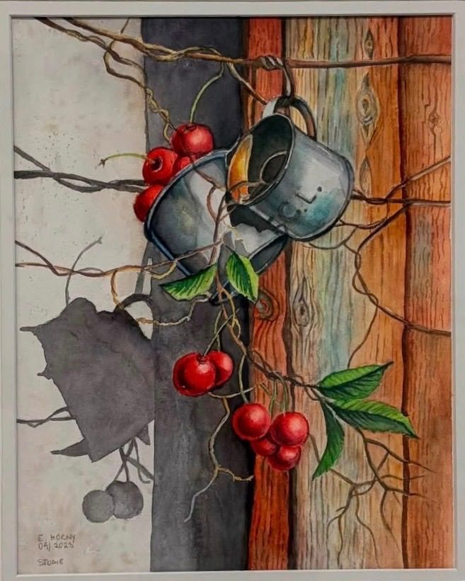 A watercolor painting depicts a wooden post with red cherries hanging from it, accompanied by two metal cups. The post is surrounded by green leaves and branches.