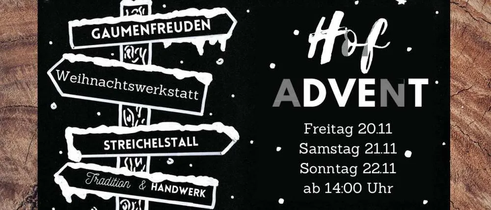 Ein Plakat, das eine Weihnachtswerkstatt ankündigt, mit einem verschneiten Berg im Hintergrund.