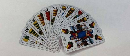 Poster for a card game event. Scheduled for Saturday, November 22, starting at 6 PM at the Rettungzentrum Tragoß. Entry fee is 15 euros. First prize is a voucher worth 150 euros, and second prize is a voucher worth 100 euros.