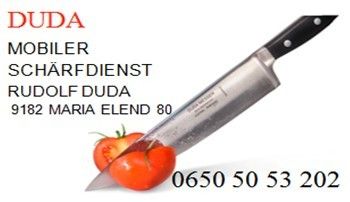 Advertisement for a mobile knife sharpening service by Rudolf Duda, located at 9182 Maria Elend 80. The image features a large knife cutting through a tomato with contact information 0650 50 53 202.