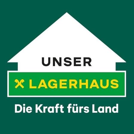 Das Bild zeigt einen grünen Hintergrund mit einem weißen Haus-förmigen Logo über dem Text 'UNSER LAGERAUS' und darunter 'Die Kraft fürs Land'. Das Logo zeigt einen gekreuzten Hammer und ein Haus.