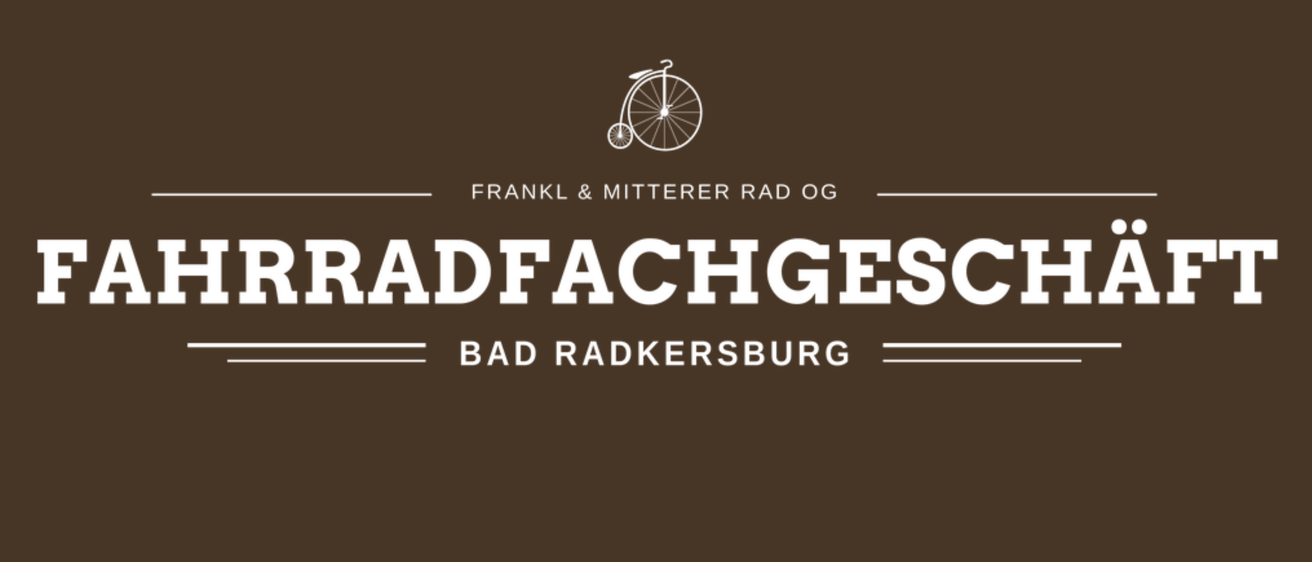 Ein braunes Bild mit einem Fahrradlogo über dem Text 'Frankl & Mitterer Rad OG' und darunter die Worte 'ADFACHGES' und 'BAD RADKERSBURG'.