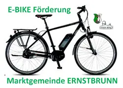Ein schwarzes E-Bike mit Akku und den Worten 'E-BIKE Forderung' und 'Marktgemeinde Ernstbrunn' auf weißem Hintergrund.