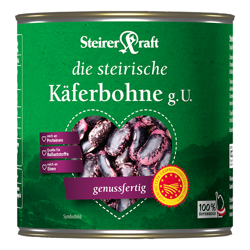 Eine grüne Dose von SteirERraft, die eine Herzform mit Bohnen im Inneren zeigt. Sie hat Etiketten wie reich an Protein, geeignet für Energie und reich an Eisen. Ein gelbes Etikett mit Logo und Text ist ebenfalls vorhanden.