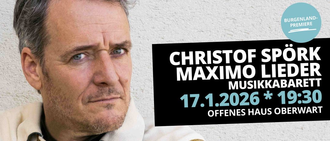 Ein ernsthafter Mann mit grauem Haar und einem weißen Hemd, neben einem schwarzen Poster mit den Worten 'CHRISTO MAXIMO MUS 17.1.2020 OFFENES H'.