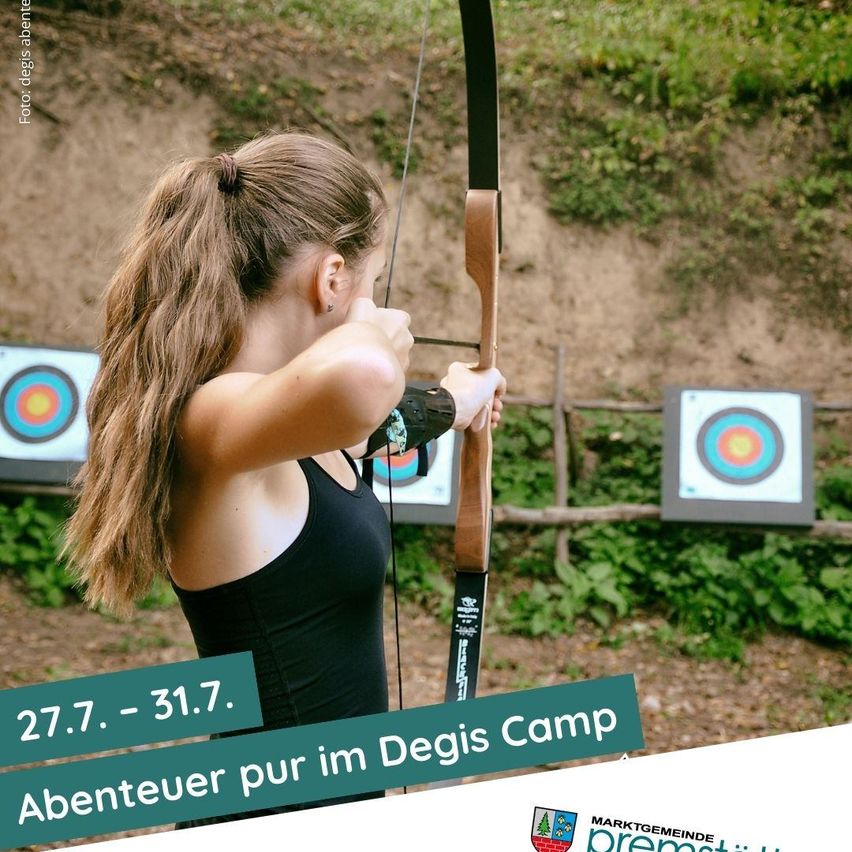 Eine Frau übt Bogenschießen im Freien und zielt mit einem Bogen auf eine Zielscheibe. Die Daten 27.7 bis 31.7 sind unten im Bild angegeben.