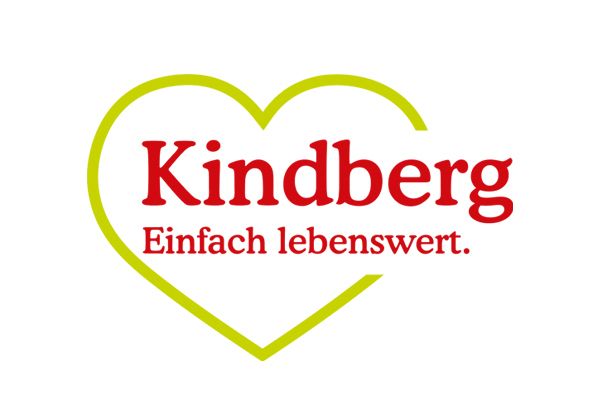 Das Logo von Kindberg zeigt eine Herzform mit den Worten 'Einfach lebenswert' im Inneren. Es vermittelt ein Gefühl von Einfachheit und Wertschätzung des Lebens.