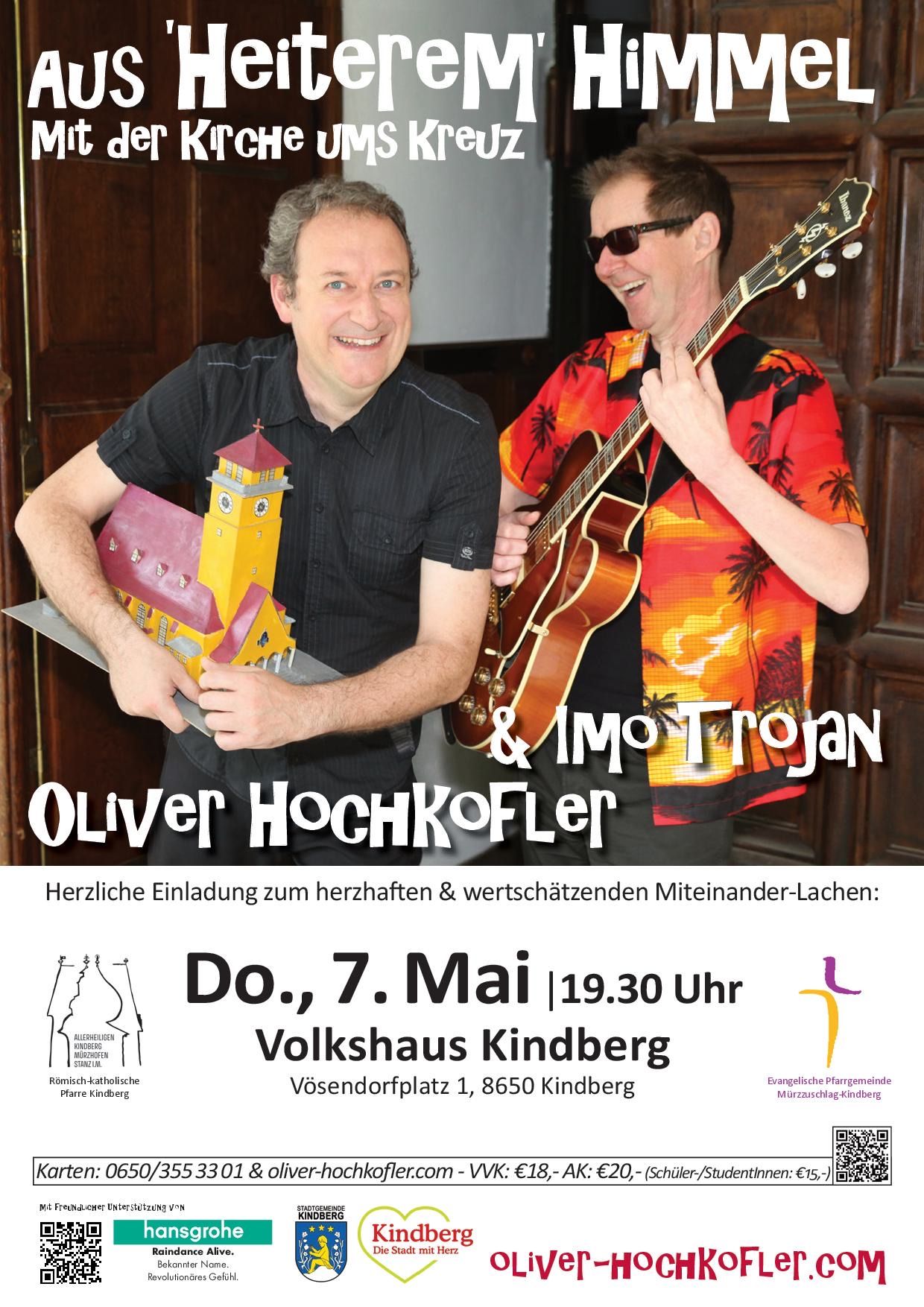 Plakat für die Aufführung von Oliver Hochkofler und Imo Trojan. Zwei lächelnde Männer, einer mit einer Gitarre, der andere mit einem kleinen Kirchenmodell. Veranstaltung am 7. Mai um 19:30 Uhr in Kindberg.