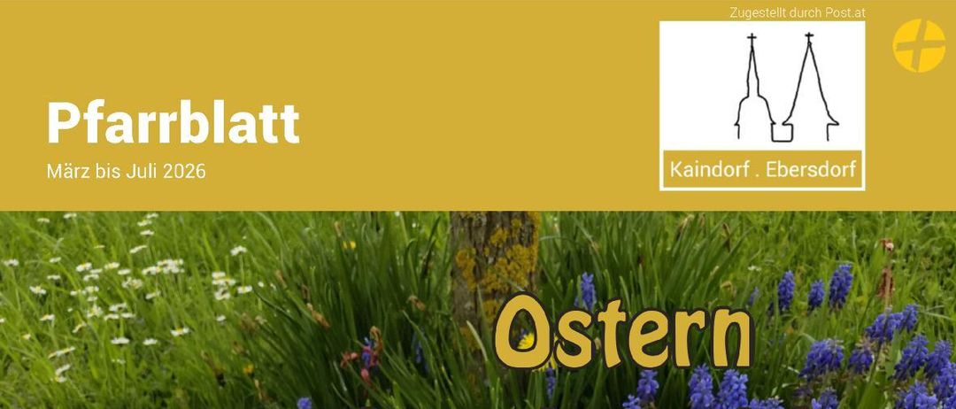 Ein Osterkorb mit einem weißen Tuch zeigt ein rotes Kreuz und den Text 'IHS'. Der Korb steht auf einem Grasfeld mit blauen Blumen. Das Bild enthält den Text 'Ostern Gottes Ja zum Leben, zum Frieden und zur Hoffnung.'