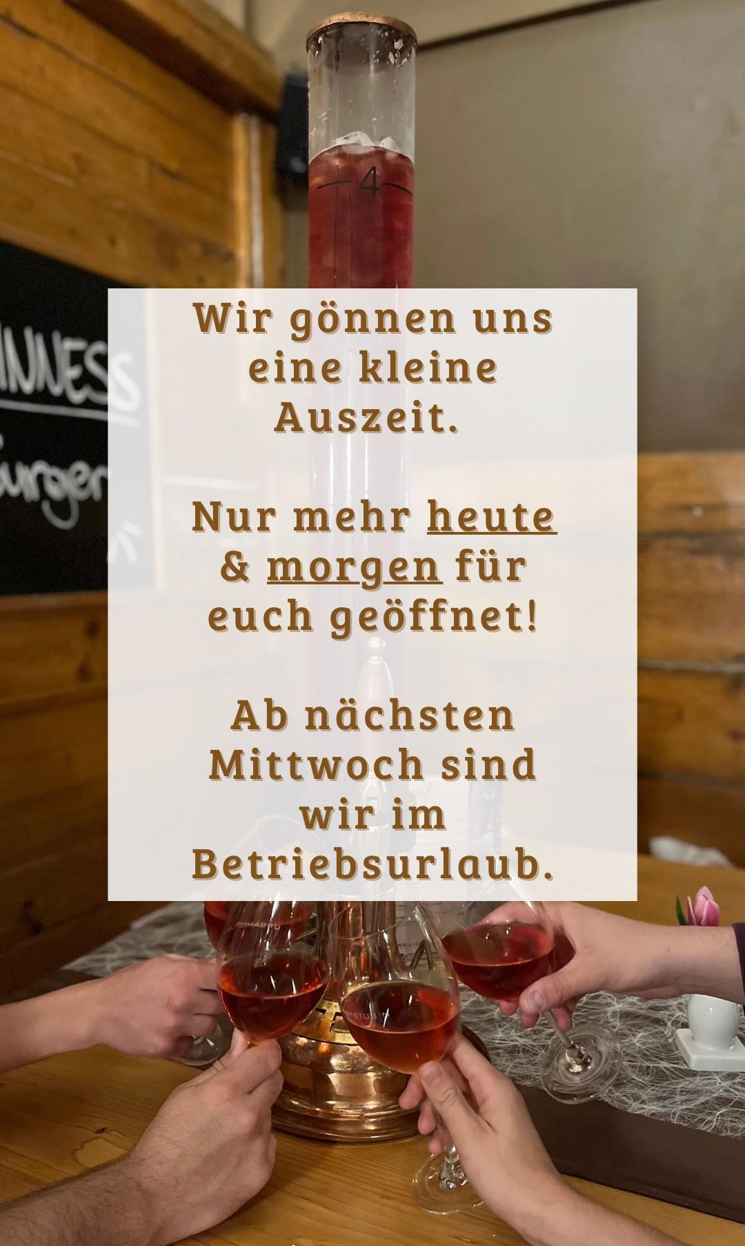 A sign in German is displayed on a white background with golden text. It reads, 'We are taking a short break. Only open today and tomorrow for you! Starting next Wednesday, we are on operational leave.'