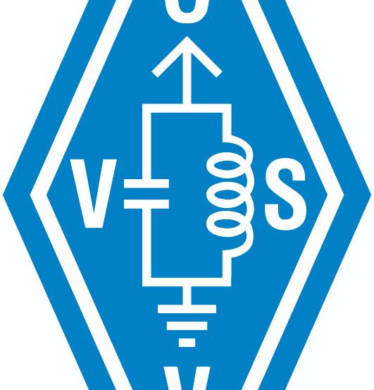 Blaues sechseckiges Symbol mit einem 'V' links und 'S' rechts, verbunden durch eine Spule. '0' über der Spule.