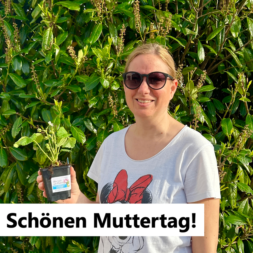 A woman in sunglasses holds a potted plant, smiling, in front of a green bush. The text reads 'Schönen Muttertag!' at the bottom.