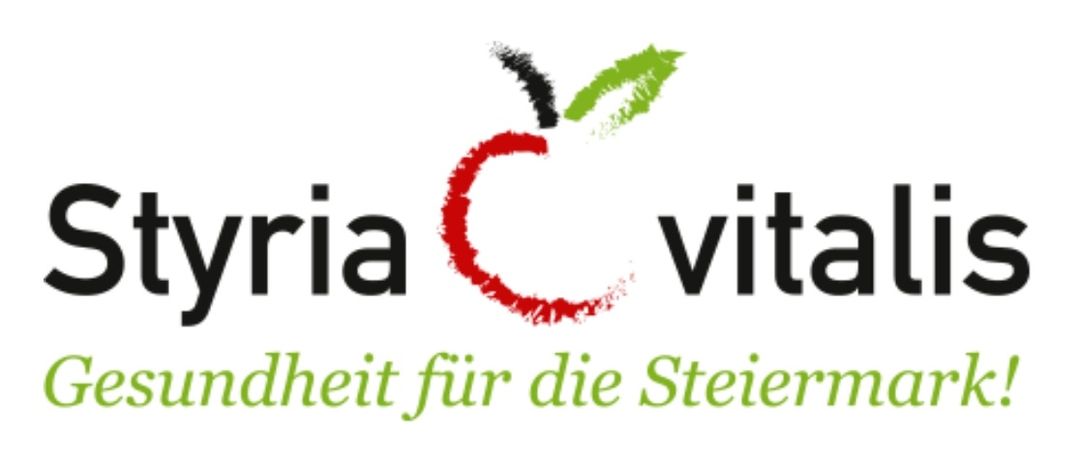 Das Logo von 'Vitalis' zeigt ein Apfeldesign mit grünem Blatt und rotem Bissmarke, begleitet von dem Text 'Gesundheit für die Steiermark.'