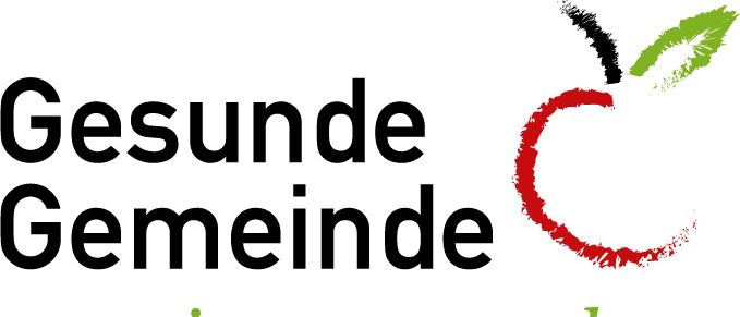 Das Logo für 'Gesunde Gemeinde' mit einem roten Apfel und einem grünen Blatt, in schwarzen und grünen Text.