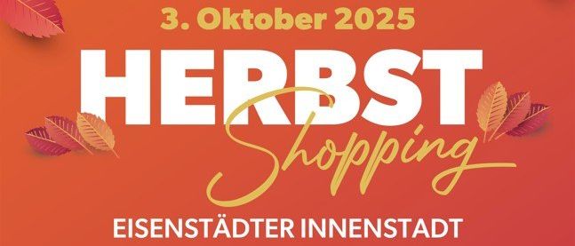 Ein orangefarbenes Plakat kündigt 'Herbst Shopping' am 3. Oktober 2025 in der Eisenstädter Innenstadt an, geschmückt mit Herbstblättern.