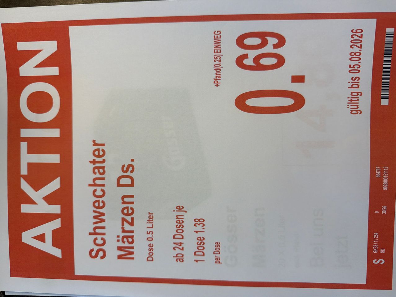 Ein Schild mit rotem Text auf weißem Hintergrund. Es steht 'Schwechater Märzen DS', 'Dose 0,5 Liter', 'ab 24 Dosen je 1,38' und 'Dose 1 pro Dose'. Der Preis ist 0,69.