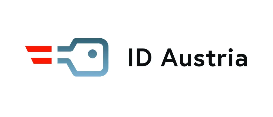 Das ID Austria Logo zeigt einen stilisierten Schlüssel mit einem roten und blauen Streifen und einem Punkt in der Mitte, neben dem Text 'ID Austria' in fetten schwarzen Buchstaben.