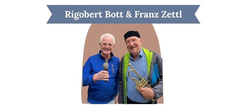 Plakat für eine Theaterveranstaltung mit Rigobert Bott und Franz Zettl, mit einem Mann mit Trompete auf der rechten und einem Mann mit Mikrofon auf der linken Seite. Das Plakat enthält Details wie Datum, Uhrzeit und Reservierungsnummer.