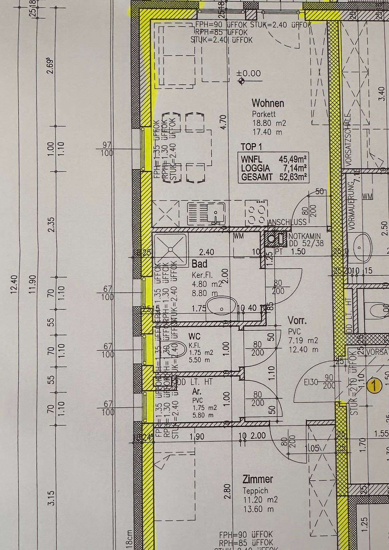Blueprint of a residential layout showing dimensions and areas of various rooms. Includes a bathroom, living room, and multiple other spaces with measurements. Marked areas include living space, bathroom, and storage.