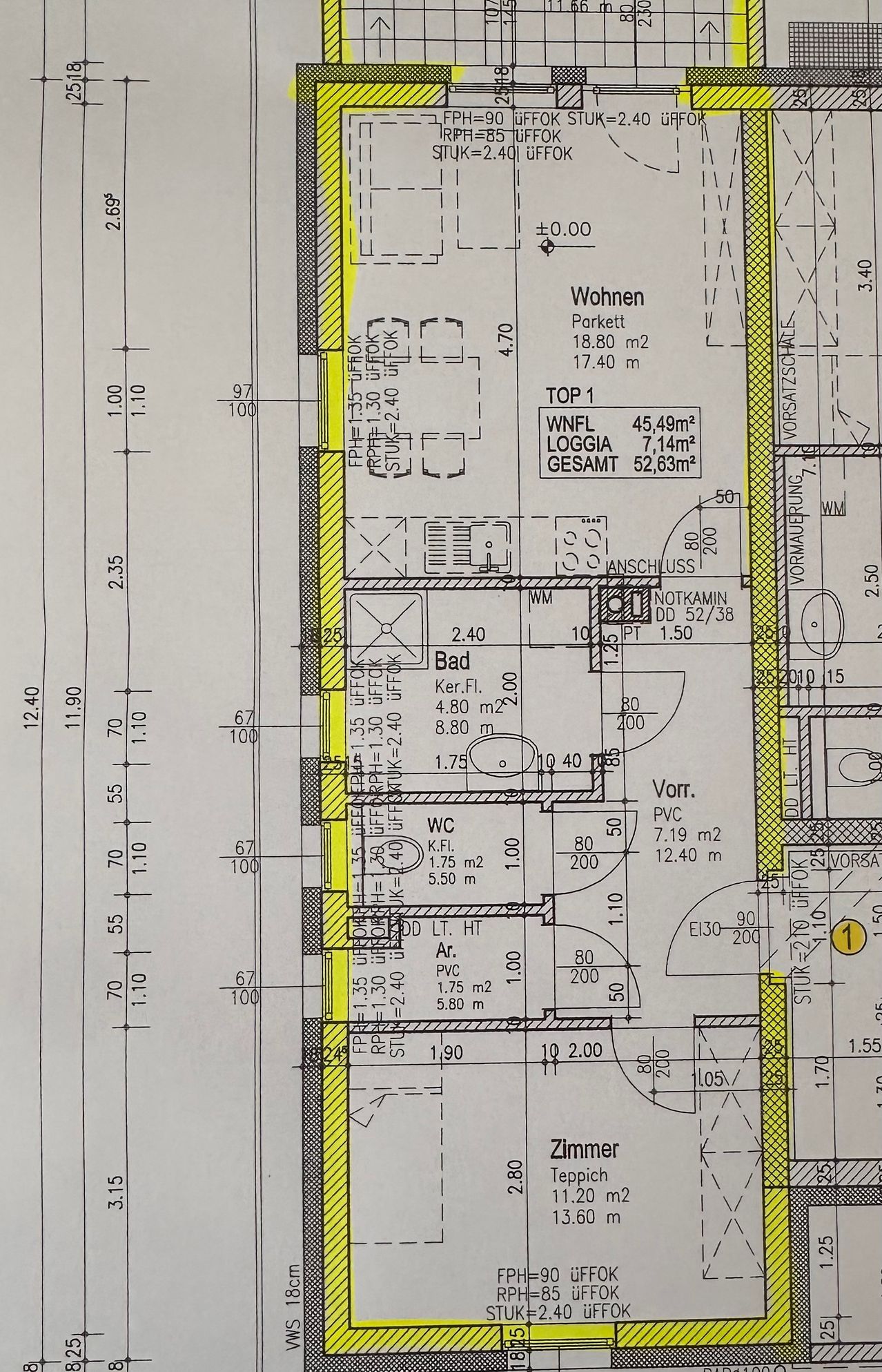 Blueprint of a residential layout showing dimensions and areas of various rooms. Includes a bathroom, living room, and multiple other spaces with measurements. Marked areas include living space, bathroom, and storage.