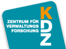 Ein blaues und weißes Schild mit dem Text 'Zentrum für Verwaltungs Forschung' und den Buchstaben 'KZ' in Gelb.