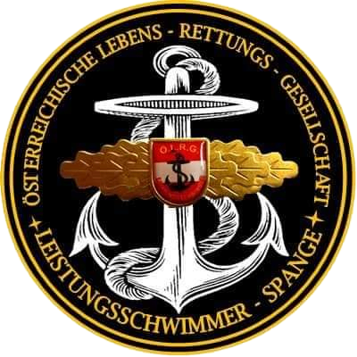 Das Emblem zeigt einen schwarzen und goldenen Kreis mit einem weißen Anker in der Mitte. Der Anker hat einen roten Schild mit den Buchstaben 'O.R.G' und einem Symbol darauf. Der Kreis hat den Text 'ÖSTERREICHISCHE LEBENS-RETTUNGS-GESELLSCHAFT' und 'LEITUNGSSCHWIMME' in goldener Schrift.