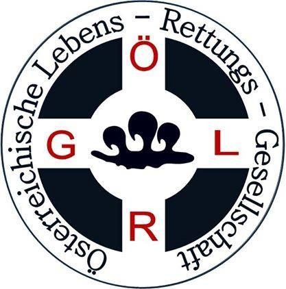 Das kreisförmige Logo zeigt ein Kreuz mit den Buchstaben G, Ö, L und R an jeder Ecke. Der Name der Organisation 'Deutsche Lebens-Rettungs-Gesellschaft' ist um den Kreis herumgeschrieben. Das Kreuz hat einen roten Hintergrund.
