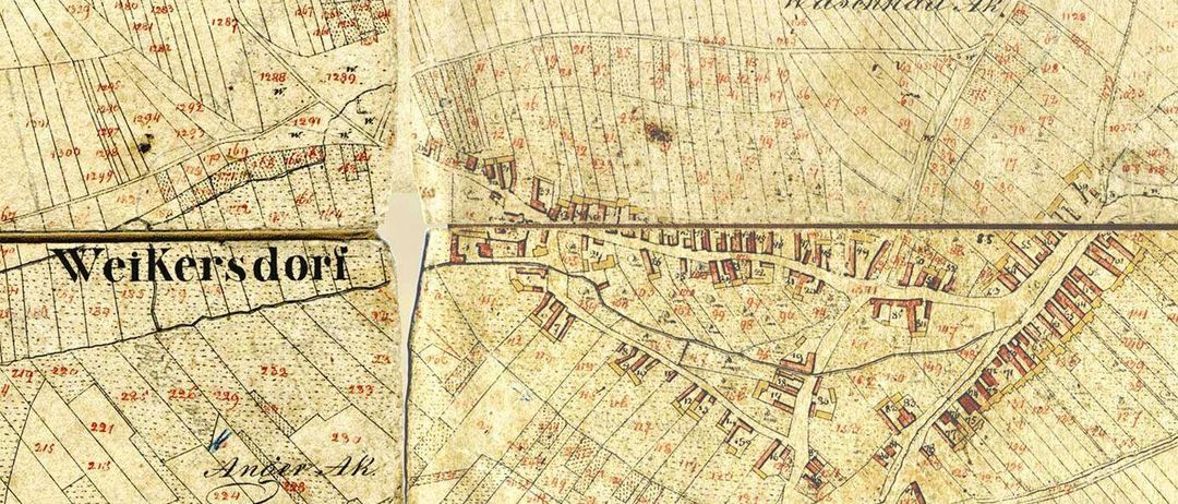Eine alte Karte mit verschiedenen handschriftlichen Notizen und Markierungen, einschließlich Namen wie 'Wassenhofdat' und 'Ander Ah'. Die Karte zeigt eine Region mit einem Rasterlayout und detaillierten Straßenplänen, möglicherweise aus einer historischen Epoche.