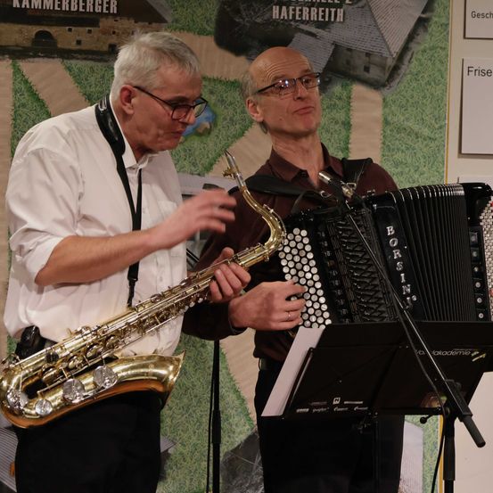 Glasses, Adult, Male, Man, Person, Group Performance, Music Band, Musical Instrument, Microphone, Saxophone