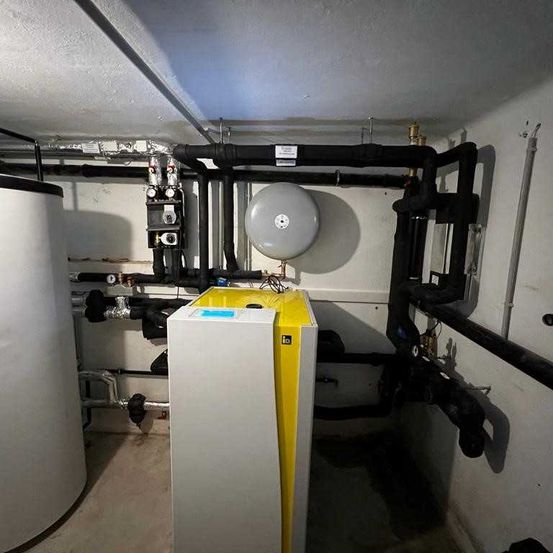 Indoors, Basement, Room, Airplane, Transportation, Vehicle, Person, Plumbing