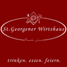 Ein Logo für St. Georgener Wirtshaus, mit einem Teller, Gabel und Messer, und dem Slogan 'trinken. essen. feiern.' in weißer Schrift.