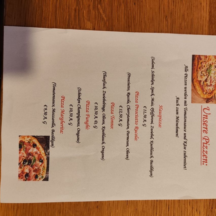 A pizza menu lists various pizza types with prices and ingredients. At the top, it says 'Unsere Pizzen' (Our Pizzas). The prices are in Euros.