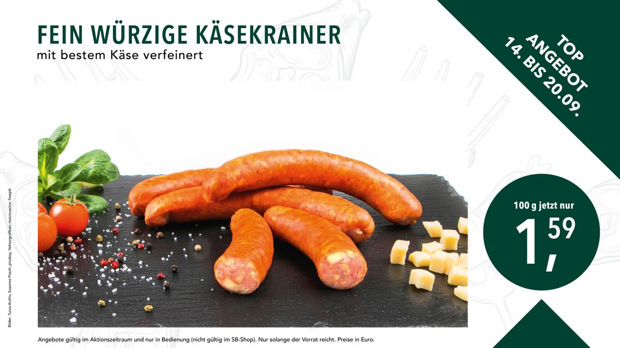 A close-up of several sausages and cheese cubes on a black surface with a blurry background. The sausages are arranged in a row with some overlapping.