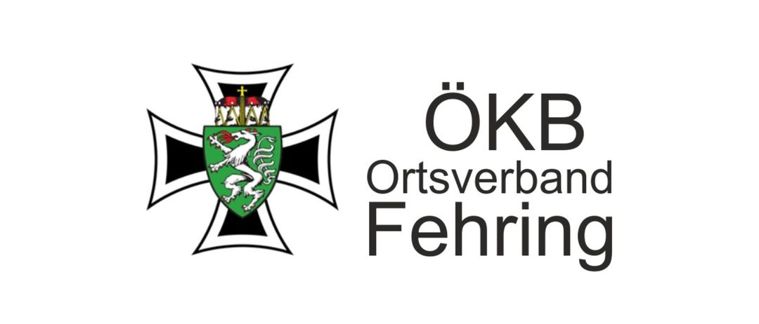 Ein Emblem mit den Worten 'OK Ortsverband Fehrin', das ein Wappen mit einem Kreuz und einem weißen Löwen auf einem grünen Schild zeigt.
