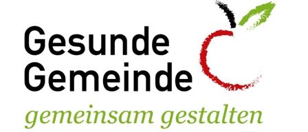 Das Logo von Gesunde Gemeinde zeigt einen roten Apfel mit einem grünen Blatt in fetten schwarzen Buchstaben. Der Text lautet 'Gesunde Gemeinde' und 'gemeinschaft gestaltet'.