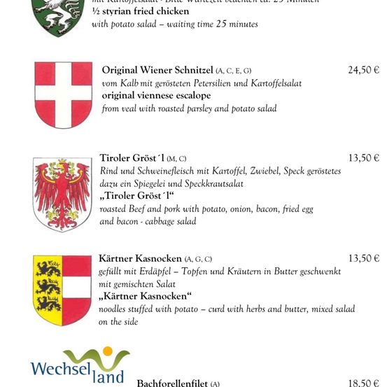 Die Speisekarte bietet unter anderem halb steirisches gebratenes Huhn mit Kartoffelsalat, Original Wiener Schnitzel aus Kalbfleisch mit Petersilie und Kartoffelsalat, Tiroler Groß mit Rind- und Schweinefleisch sowie Kärtner Kasnocken mit Kartoffeln und gemischtem Salat. Die Preise liegen zwischen 13,50 und 24,50 Euro.