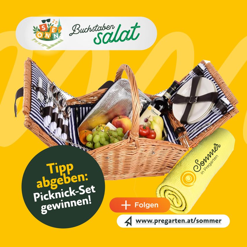 Eine Werbung für einen Picknickkorb mit Obst, Wein und Utensilien auf gelbem Hintergrund. Ein grüner Kreis mit dem Text 'Tipp abgeben: Picknick-Set gewinnen!' ist links.