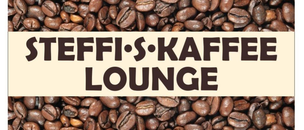 Ein Bild zeigt einen Haufen Kaffeebohnen mit den Worten 'Teffis Kaffe Lounge' in brauner Schrift.