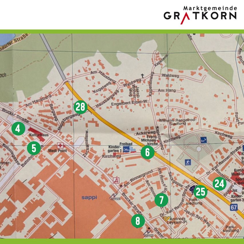 Karte von Gratkorn mit nummerierten Punkten, einschließlich eines Kulturzentrums, Kindergarten und verschiedener Straßen und Wahrzeichen.