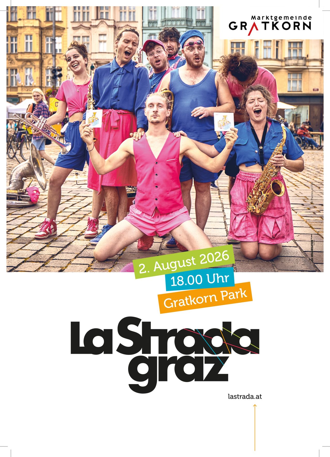 A group of musicians in pink and blue outfits are performing on a brick street with a trumpet and saxophone. The event is scheduled for August 2, 2026, at 6:00 PM at Gratkorn Park.