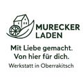 Logo für Murecker Laden, eine lokale Werkstatt in Oberraitsch, zeigt ein Haus mit einem Rad auf einem Blatt und betont Liebe und Sorgfalt in ihrer Handwerkskunst.