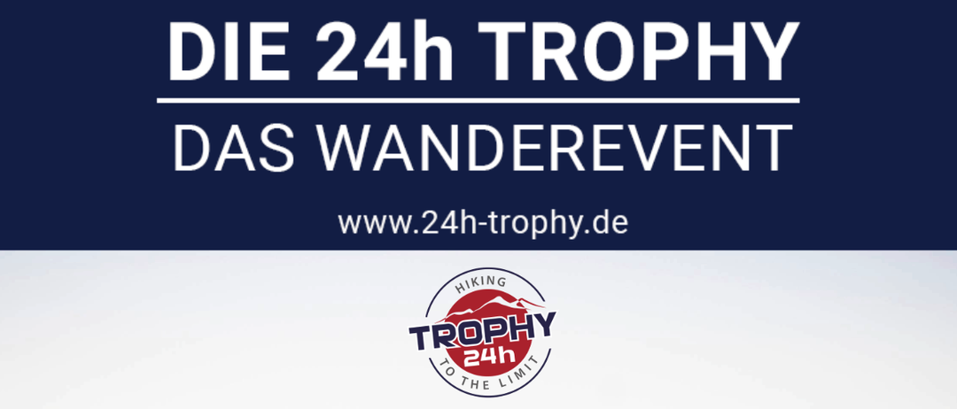 Eine Gruppe von Wanderern auf dem Gipfel einer Bergkette, die mit einem Kreuz feiern. Die Veranstaltung ist für den 19.-21. September 2025 in Berchtesgaden geplant.